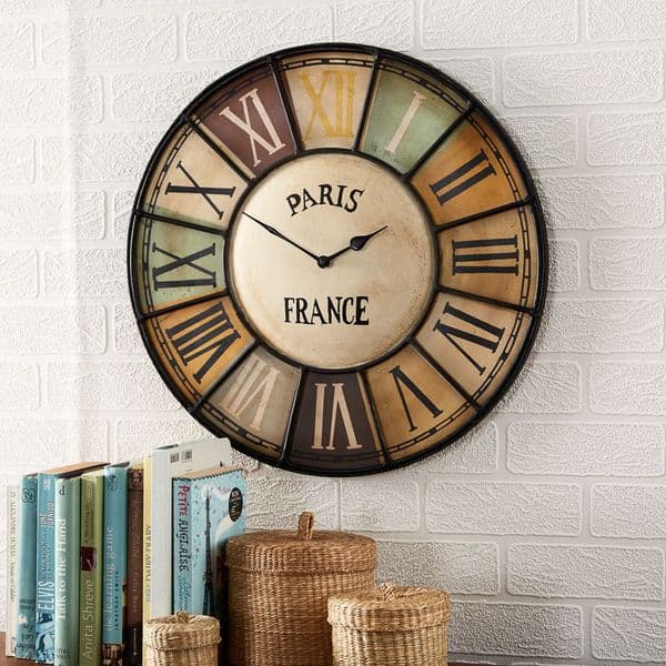 Vintage Metal Wall Clock | Multi coloured metal wall clock with roman numerals.